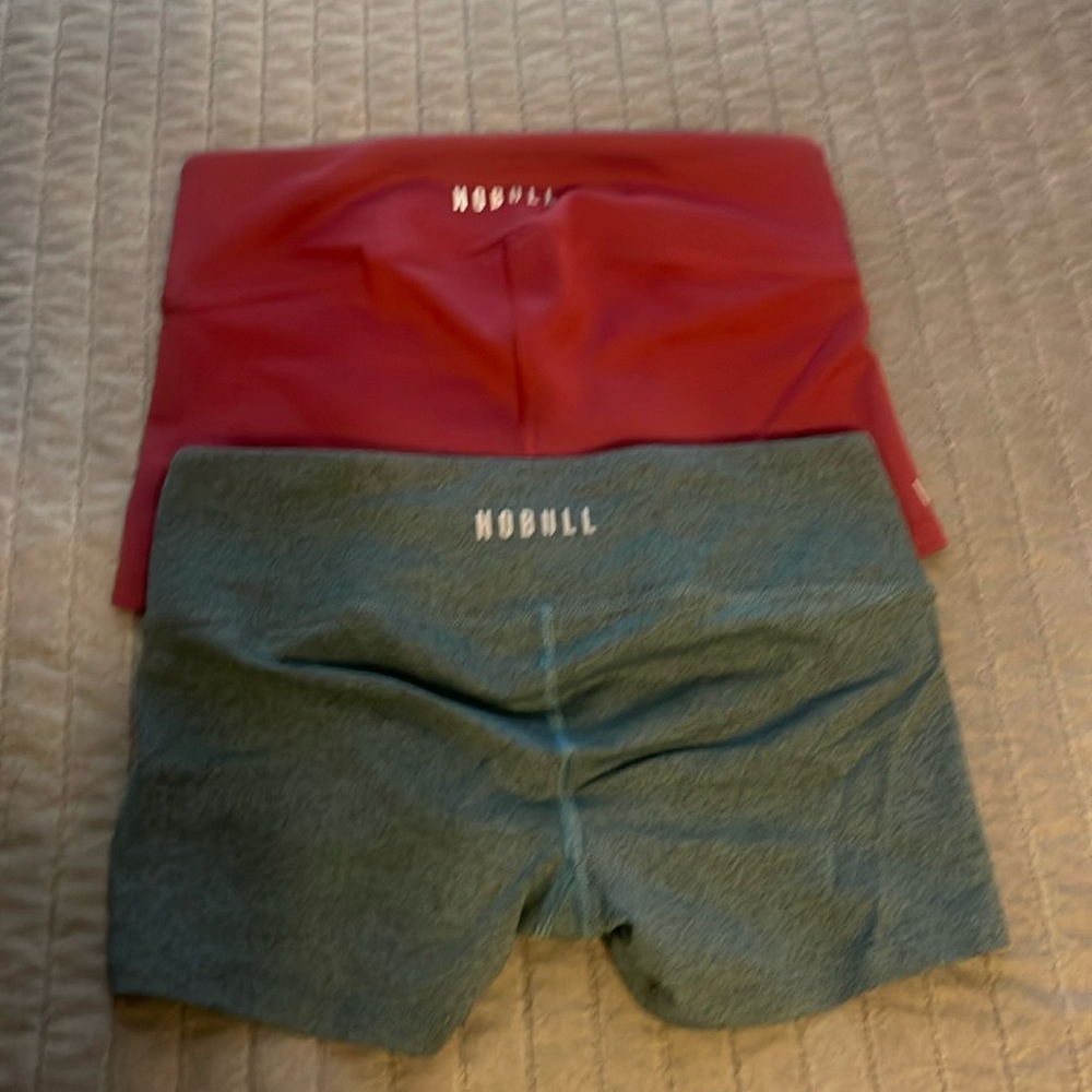 Gently used low waist 2 pair of womens Nobull shorts